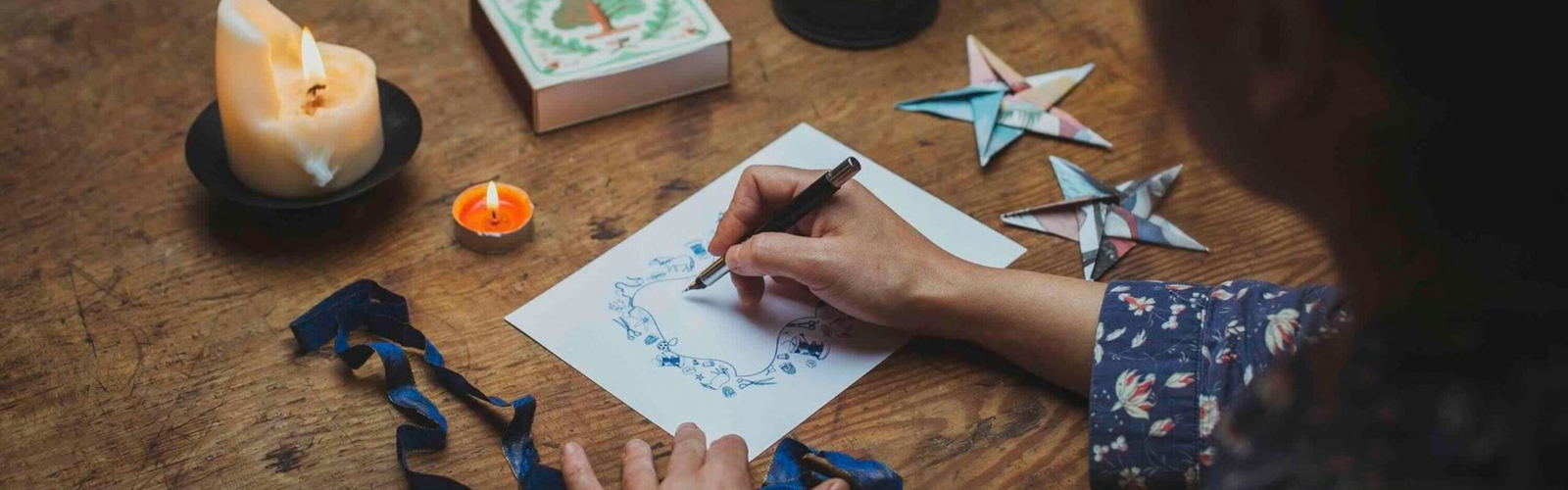 Handwriting a gift voucher for a sewing class